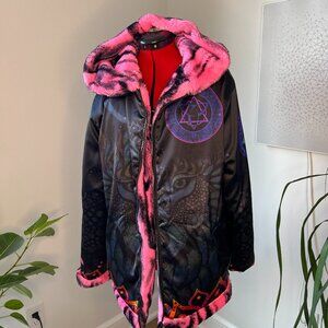 - Extremely soft and striking reversible faux fur jacket